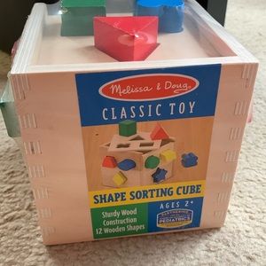 Melissa & Doug shape sorting cube toy